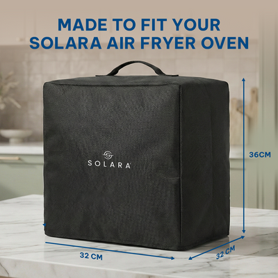 Black cover for Solara air fryer oven with dimensions on a marble surface
